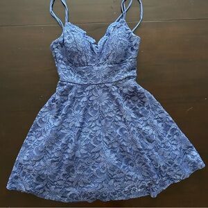 Sparkly blue lace homecoming mini dress with built in cups